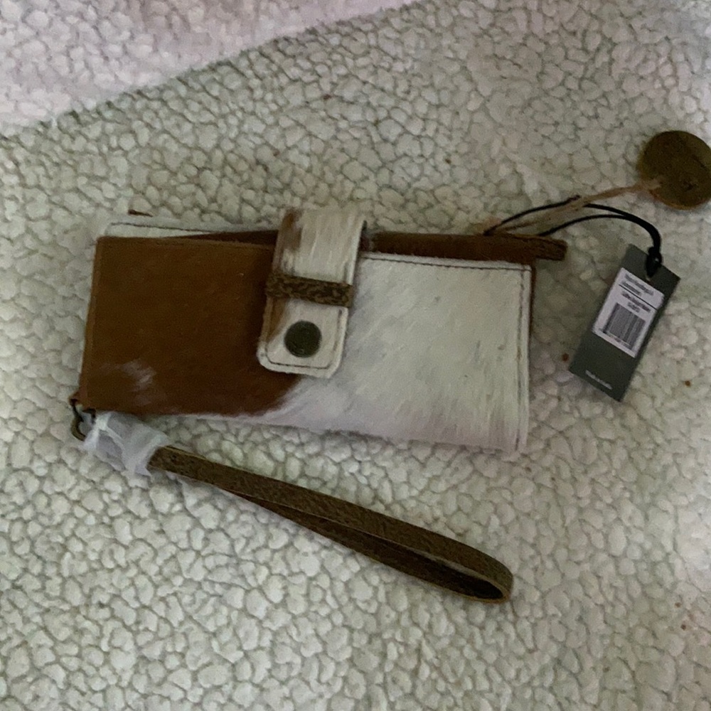 Myra cow hair wristlet wallet